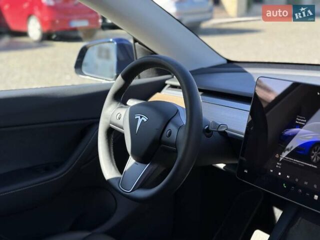 Синий Тесла Model Y, объемом двигателя 0 л и пробегом 80 тыс. км за 25300 $, фото 90 на Automoto.ua