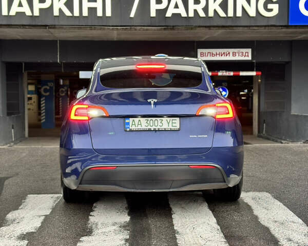 Синий Тесла Model Y, объемом двигателя 0 л и пробегом 104 тыс. км за 22900 $, фото 6 на Automoto.ua