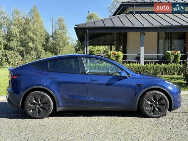 Синий Тесла Model Y, объемом двигателя 0 л и пробегом 80 тыс. км за 25300 $, фото 4 на Automoto.ua