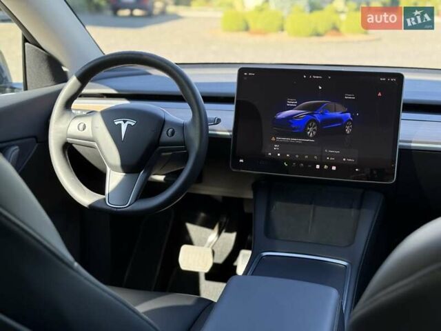 Синий Тесла Model Y, объемом двигателя 0 л и пробегом 80 тыс. км за 25300 $, фото 110 на Automoto.ua