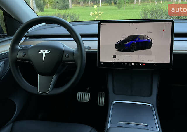 Синий Тесла Model Y, объемом двигателя 0 л и пробегом 84 тыс. км за 26900 $, фото 34 на Automoto.ua