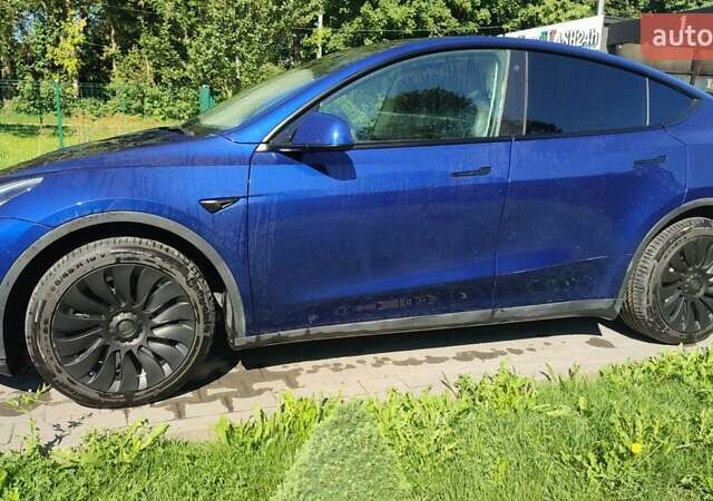 Синий Тесла Model Y, объемом двигателя 0 л и пробегом 54 тыс. км за 29900 $, фото 4 на Automoto.ua