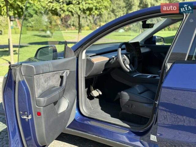Синий Тесла Model Y, объемом двигателя 0 л и пробегом 80 тыс. км за 25300 $, фото 72 на Automoto.ua