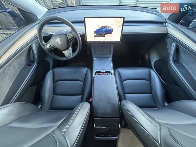 Синий Тесла Model Y, объемом двигателя 0 л и пробегом 93 тыс. км за 25500 $, фото 7 на Automoto.ua