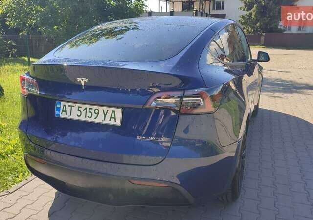 Синий Тесла Model Y, объемом двигателя 0 л и пробегом 54 тыс. км за 29900 $, фото 19 на Automoto.ua