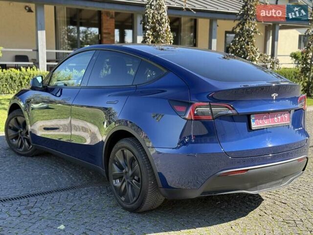 Синий Тесла Model Y, объемом двигателя 0 л и пробегом 80 тыс. км за 25300 $, фото 54 на Automoto.ua