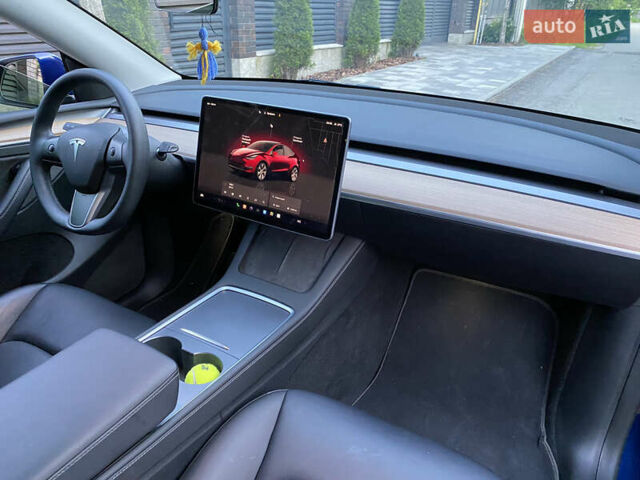 Тесла Model Y 2022 в Киеве на Automoto.ua Синий Тесла Model Y, объемом двигателя 0 л и пробегом 54 тыс. км за 26600 $, фото 23 на Automoto.ua