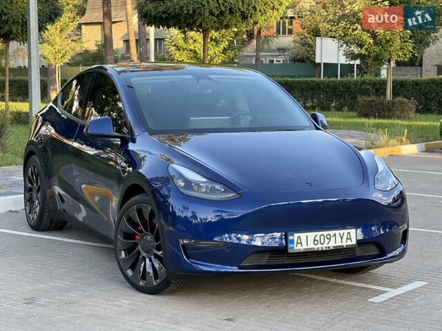 Синий Тесла Model Y, объемом двигателя 0 л и пробегом 84 тыс. км за 26900 $, фото 3 на Automoto.ua