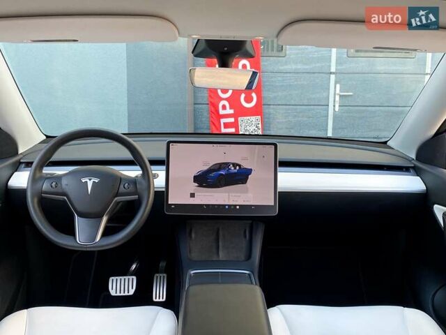 Синий Тесла Model Y, объемом двигателя 0 л и пробегом 92 тыс. км за 31999 $, фото 16 на Automoto.ua
