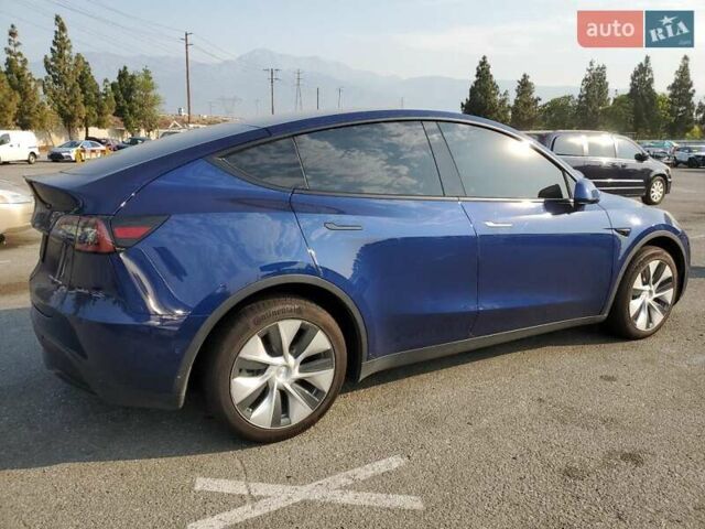 Синий Тесла Model Y, объемом двигателя 0 л и пробегом 52 тыс. км за 24990 $, фото 4 на Automoto.ua