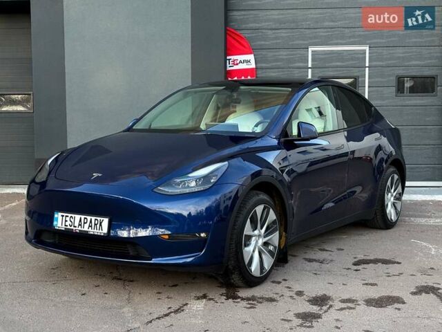 Синий Тесла Model Y, объемом двигателя 0 л и пробегом 59 тыс. км за 32999 $, фото 2 на Automoto.ua