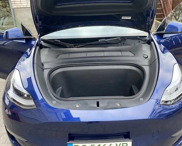 Синий Тесла Model Y, объемом двигателя 0 л и пробегом 89 тыс. км за 22000 $, фото 12 на Automoto.ua