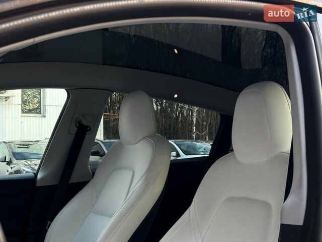Синий Тесла Model Y, объемом двигателя 0 л и пробегом 59 тыс. км за 32999 $, фото 12 на Automoto.ua