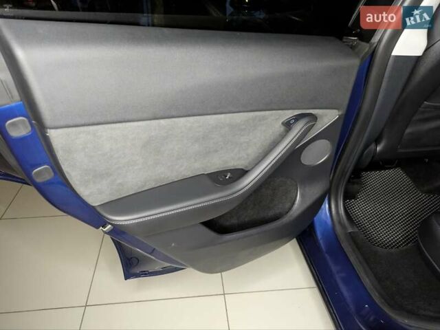 Синий Тесла Model Y, объемом двигателя 0 л и пробегом 51 тыс. км за 30900 $, фото 26 на Automoto.ua