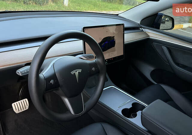 Синий Тесла Model Y, объемом двигателя 0 л и пробегом 84 тыс. км за 26900 $, фото 56 на Automoto.ua