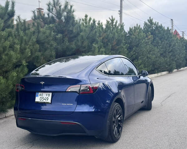 Синий Тесла Model Y, объемом двигателя 0 л и пробегом 52 тыс. км за 30900 $, фото 48 на Automoto.ua