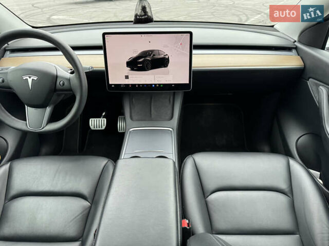 Синий Тесла Model Y, объемом двигателя 0 л и пробегом 66 тыс. км за 24100 $, фото 15 на Automoto.ua