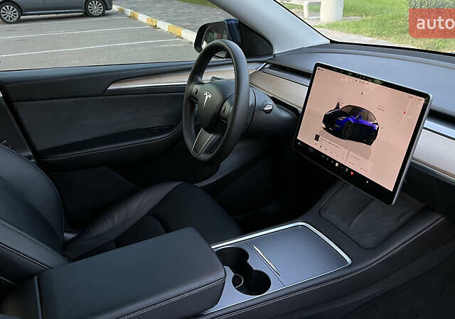 Синий Тесла Model Y, объемом двигателя 0 л и пробегом 84 тыс. км за 26900 $, фото 33 на Automoto.ua