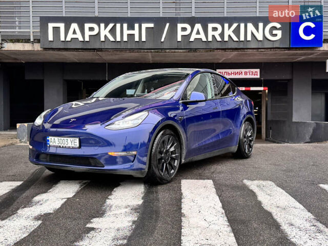 Синий Тесла Model Y, объемом двигателя 0 л и пробегом 104 тыс. км за 22900 $, фото 4 на Automoto.ua