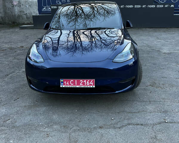 Синій Тесла Model Y, об'ємом двигуна 0 л та пробігом 76 тис. км за 23300 $, фото 1 на Automoto.ua