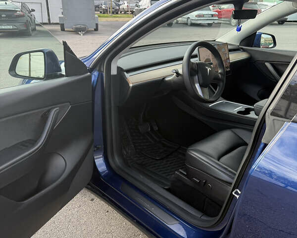 Синий Тесла Model Y, объемом двигателя 0 л и пробегом 120 тыс. км за 24399 $, фото 17 на Automoto.ua