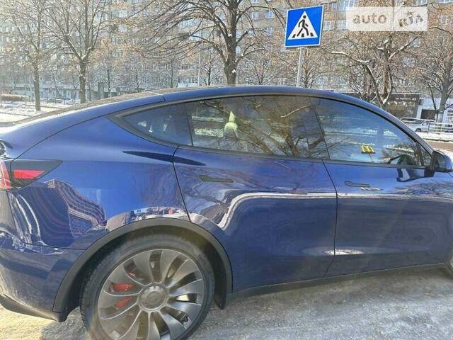 Синий Тесла Model Y, объемом двигателя 0 л и пробегом 49 тыс. км за 39500 $, фото 2 на Automoto.ua