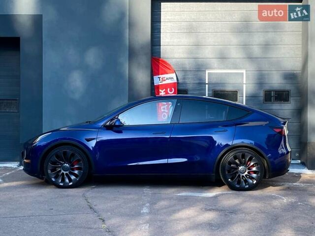 Синий Тесла Model Y, объемом двигателя 0 л и пробегом 92 тыс. км за 31999 $, фото 5 на Automoto.ua