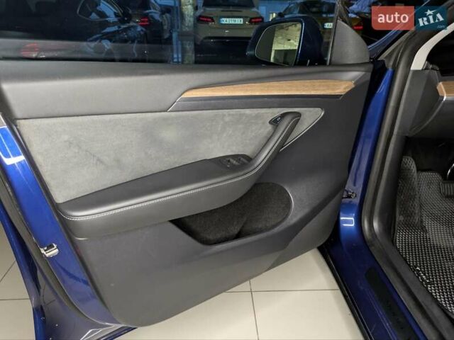 Синий Тесла Model Y, объемом двигателя 0 л и пробегом 51 тыс. км за 30900 $, фото 17 на Automoto.ua