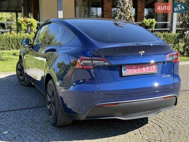 Синий Тесла Model Y, объемом двигателя 0 л и пробегом 80 тыс. км за 25300 $, фото 55 на Automoto.ua