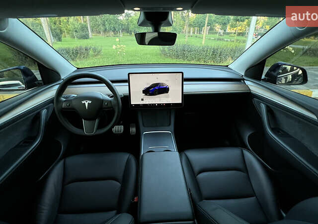 Синий Тесла Model Y, объемом двигателя 0 л и пробегом 84 тыс. км за 26900 $, фото 31 на Automoto.ua