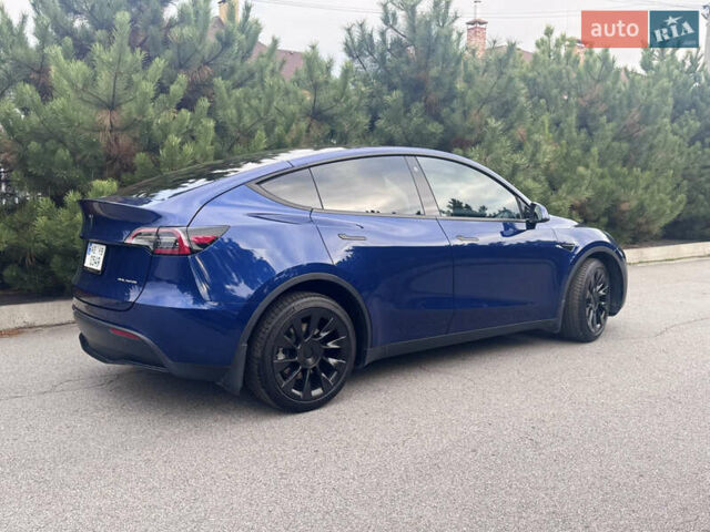 Синий Тесла Model Y, объемом двигателя 0 л и пробегом 52 тыс. км за 30900 $, фото 46 на Automoto.ua