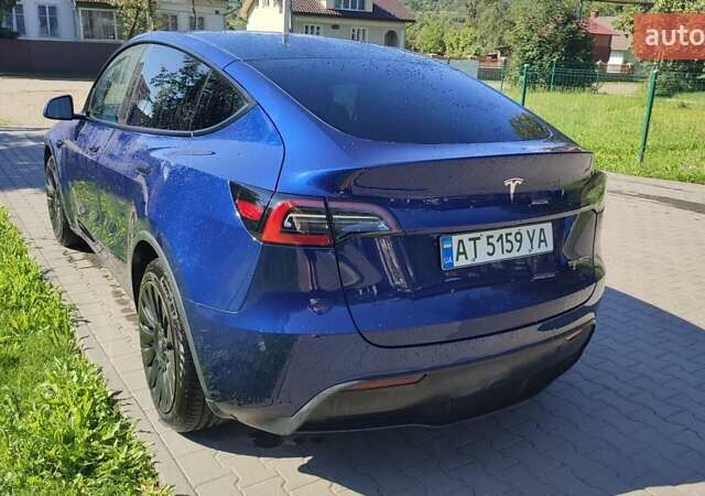 Синий Тесла Model Y, объемом двигателя 0 л и пробегом 54 тыс. км за 29900 $, фото 23 на Automoto.ua