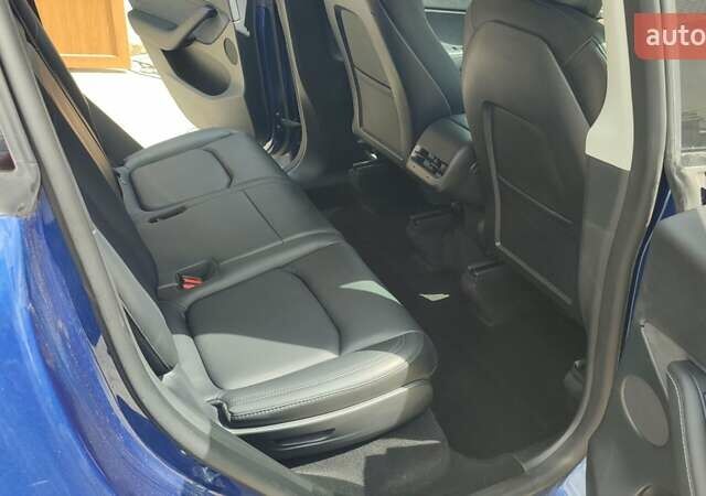 Синий Тесла Model Y, объемом двигателя 0 л и пробегом 54 тыс. км за 29900 $, фото 38 на Automoto.ua