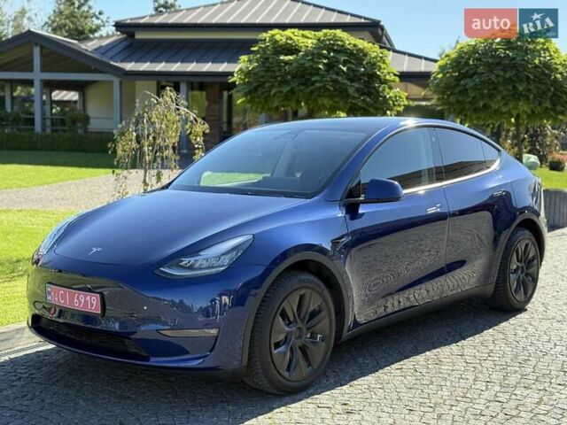 Синий Тесла Model Y, объемом двигателя 0 л и пробегом 80 тыс. км за 25300 $, фото 28 на Automoto.ua