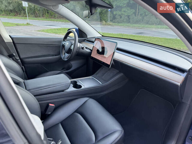Синий Тесла Model Y, объемом двигателя 0 л и пробегом 61 тыс. км за 23800 $, фото 13 на Automoto.ua