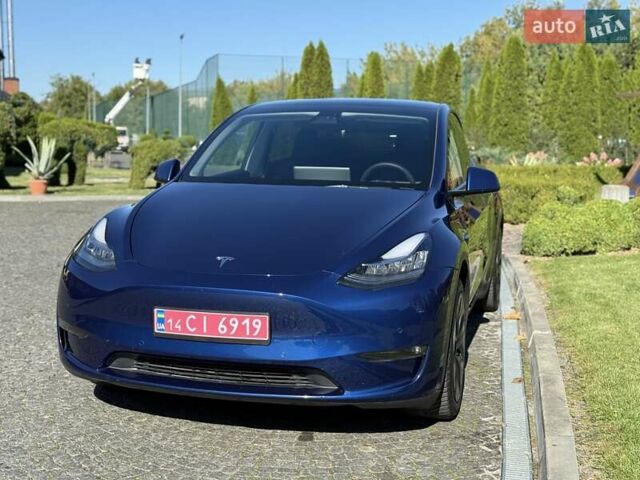 Синий Тесла Model Y, объемом двигателя 0 л и пробегом 80 тыс. км за 25300 $, фото 49 на Automoto.ua