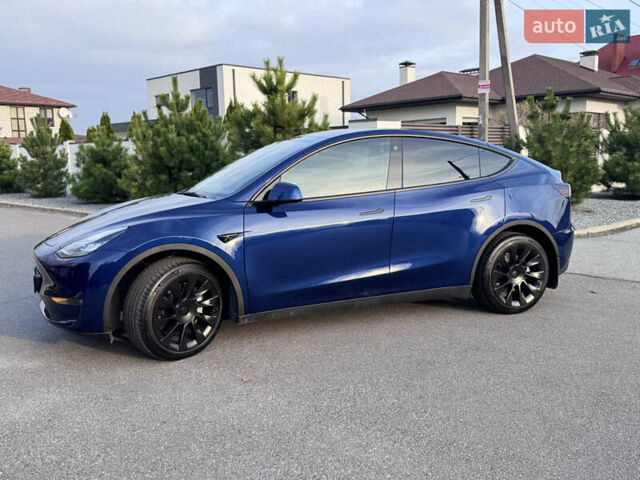 Синий Тесла Model Y, объемом двигателя 0 л и пробегом 52 тыс. км за 30900 $, фото 5 на Automoto.ua