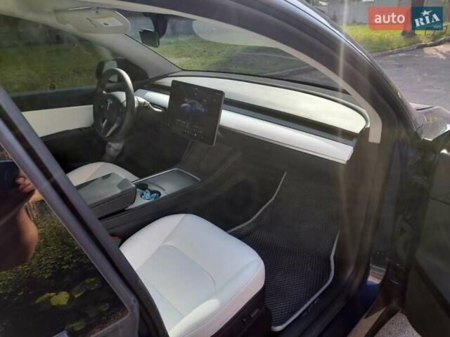 Синий Тесла Model Y, объемом двигателя 0 л и пробегом 44 тыс. км за 28000 $, фото 11 на Automoto.ua