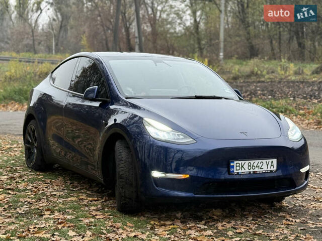 Синий Тесла Model Y, объемом двигателя 0 л и пробегом 133 тыс. км за 23900 $, фото 2 на Automoto.ua