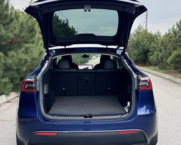 Синий Тесла Model Y, объемом двигателя 0 л и пробегом 52 тыс. км за 30900 $, фото 38 на Automoto.ua