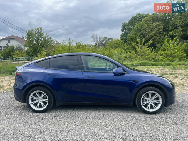 Синій Тесла Model Y, об'ємом двигуна 0 л та пробігом 91 тис. км за 23200 $, фото 3 на Automoto.ua