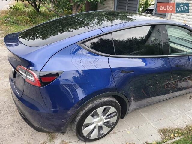 Синий Тесла Model Y, объемом двигателя 0 л и пробегом 63 тыс. км за 26500 $, фото 4 на Automoto.ua