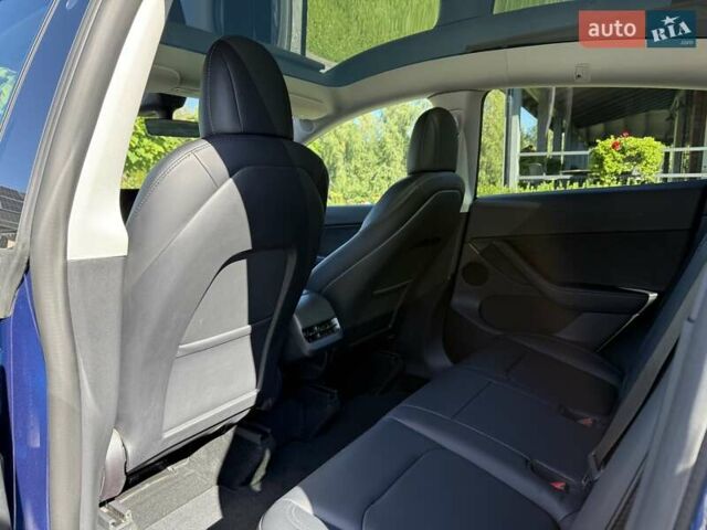Синий Тесла Model Y, объемом двигателя 0 л и пробегом 80 тыс. км за 25300 $, фото 82 на Automoto.ua