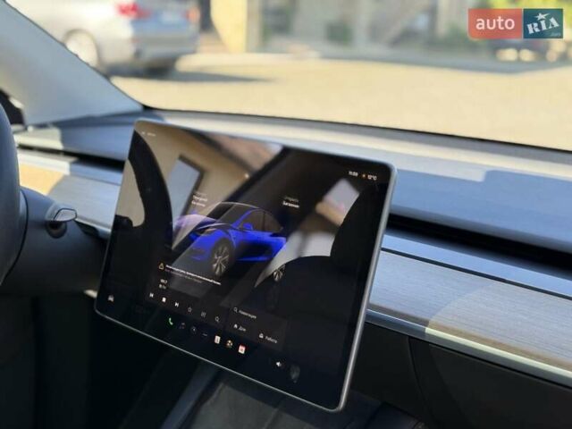 Синий Тесла Model Y, объемом двигателя 0 л и пробегом 80 тыс. км за 25300 $, фото 89 на Automoto.ua