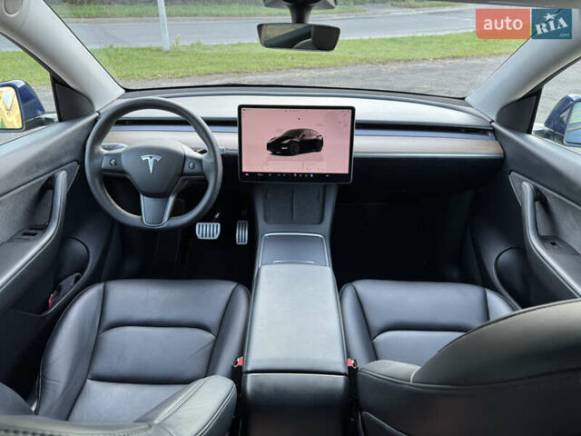 Синий Тесла Model Y, объемом двигателя 0 л и пробегом 61 тыс. км за 23800 $, фото 14 на Automoto.ua