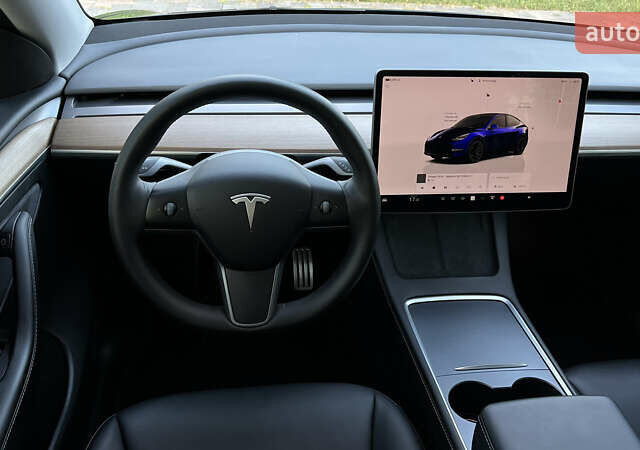 Синий Тесла Model Y, объемом двигателя 0 л и пробегом 84 тыс. км за 26900 $, фото 47 на Automoto.ua