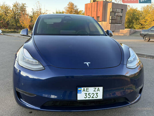 Синий Тесла Model Y, объемом двигателя 0 л и пробегом 42 тыс. км за 24500 $, фото 1 на Automoto.ua