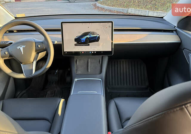 Синій Тесла Model Y, об'ємом двигуна 0 л та пробігом 18 тис. км за 26000 $, фото 10 на Automoto.ua