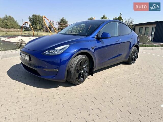Синий Тесла Model Y, объемом двигателя 0 л и пробегом 48 тыс. км за 26700 $, фото 1 на Automoto.ua