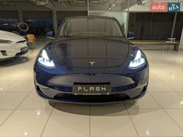 Синий Тесла Model Y, объемом двигателя 0 л и пробегом 51 тыс. км за 30900 $, фото 10 на Automoto.ua